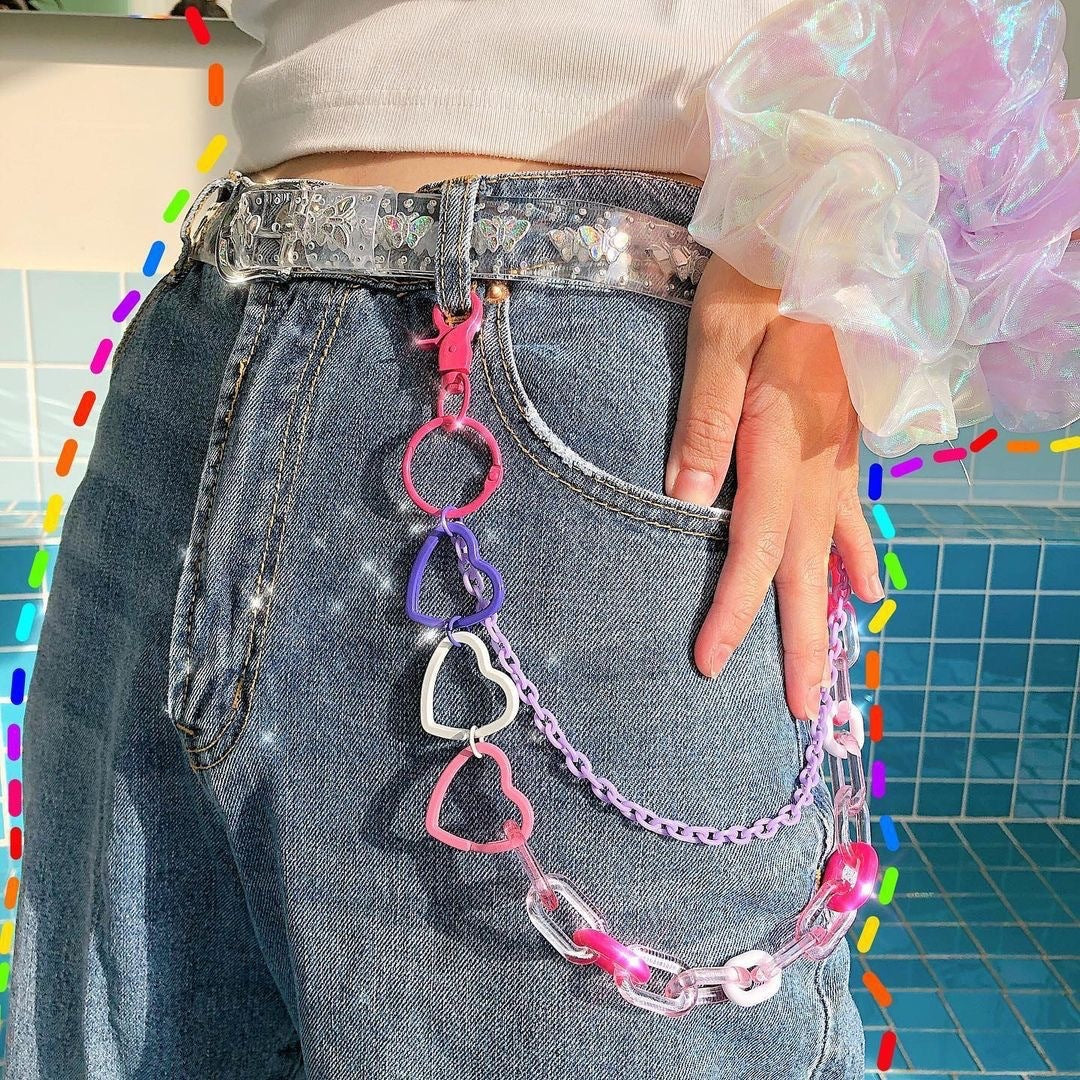 Glamorous rainbow heart bag charm & keychain. Stylish accessory for women, perfect for keys or purses.