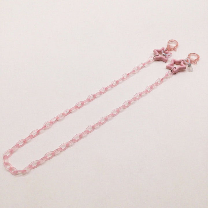 Chic sunglass holder chain for women with star charms. A stylish lanyard for keeping your shades handy.