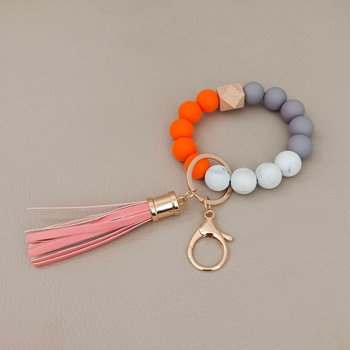 Comfortable elastic beaded bracelet keychain, practical and stylish unisex accessory for keys.
