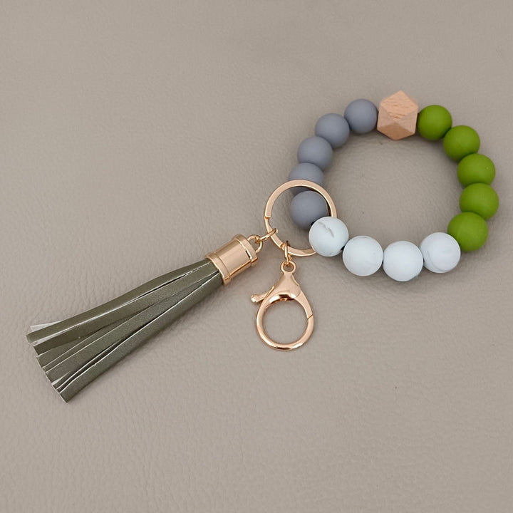Versatile unisex beaded keychain bracelet, wear as wrist accessory or attach to keys/bag.
