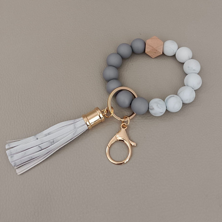 High-quality beaded silicone keychain bracelet, a durable and chic unisex fashion accessory.
