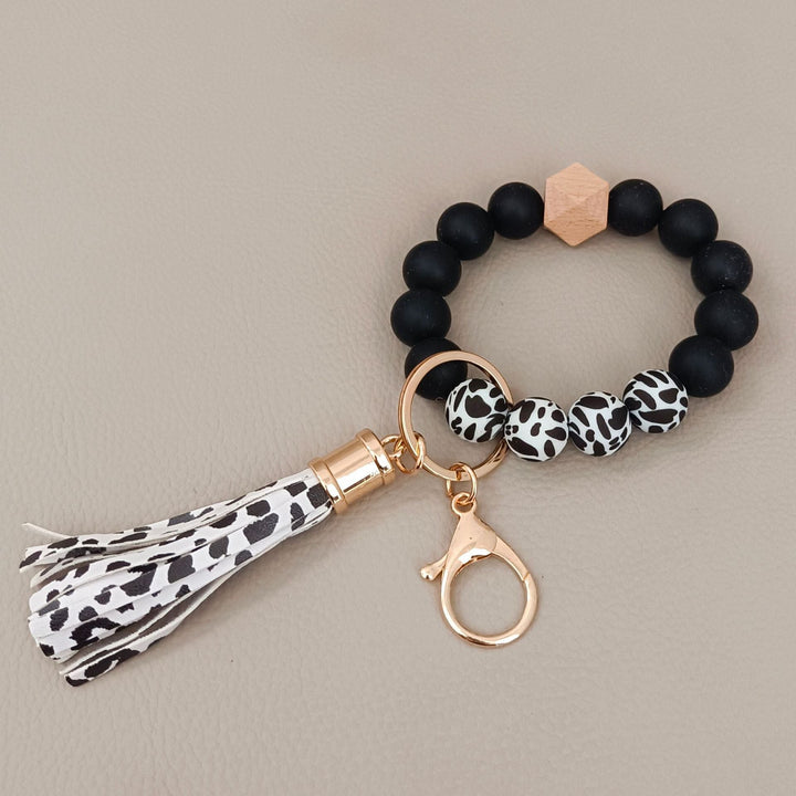 Beaded bracelet keychain in silicone, a stylish and practical unisex accessory for keys and bags.