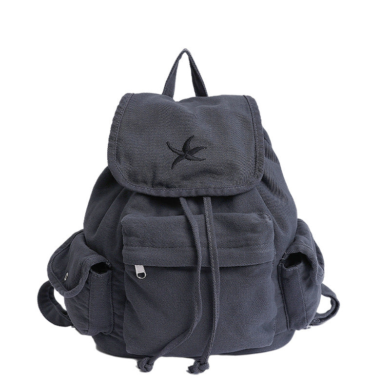 Stylish unisex canvas drawstring backpack, perfect for daily essentials, school, gym, or travel. Versatile & durable.