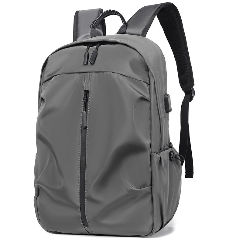 Stylish unisex commuter backpack, ideal for daily travel. Features spacious compartments for essentials & laptop.