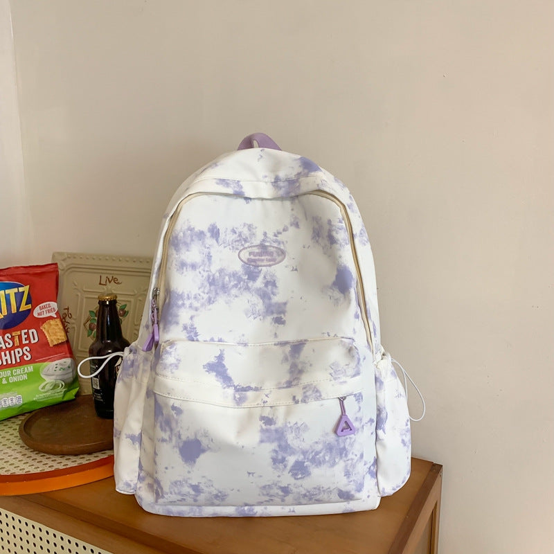 Stylish unisex everyday backpack, perfect for students, work, or travel. Features spacious compartments & durable design.