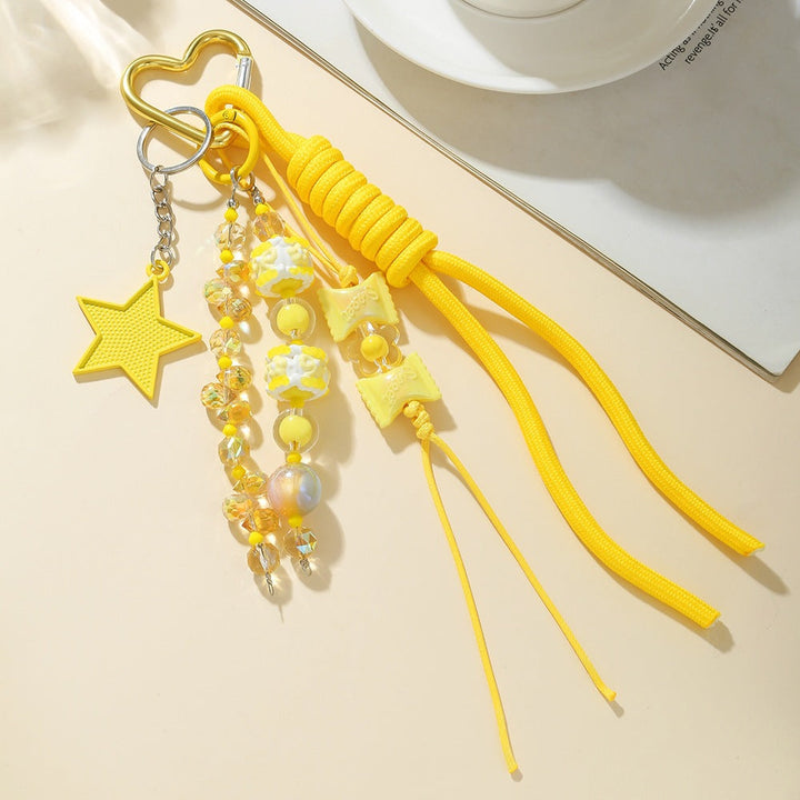 Stylish unisex heart charm keychain with durable carabiner, perfect for keys or as a vibrant bag accessory.