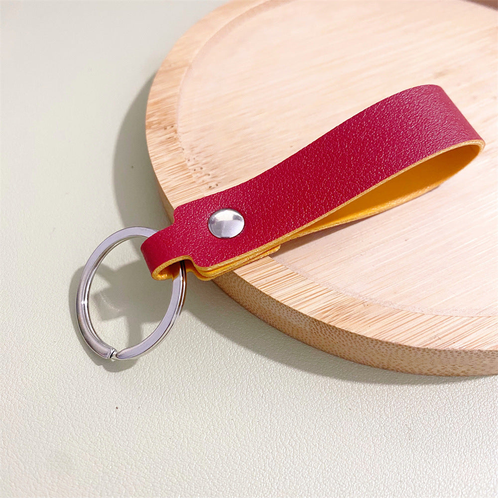 Vibrant colorful leather keyring, a durable & stylish accessory for keys and handbags. Unisex design.