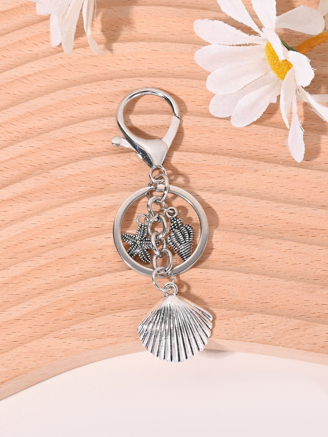 Beautiful nautical star bag charm, unisex style. Maritime key holder & accessory.