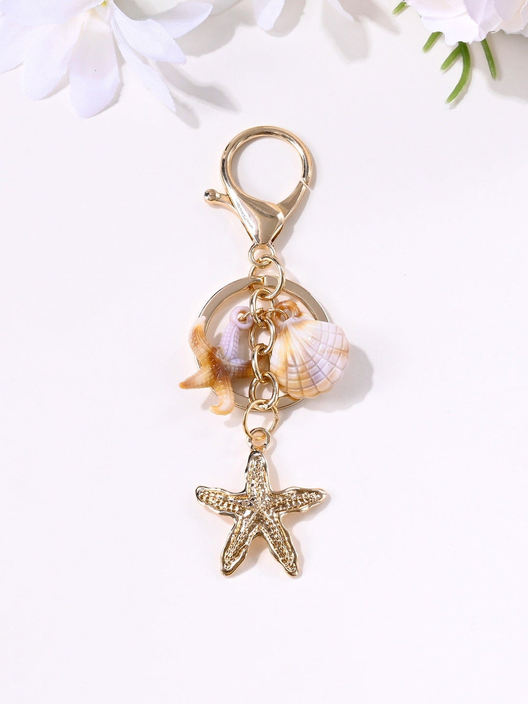 Unisex nautical star keychain; stylish key holder and bag charm for ocean lovers.