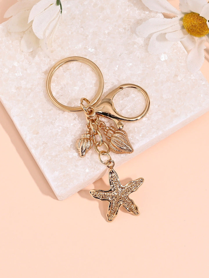 Maritime accessory: polished nautical star keychain. A chic key holder, great gift.