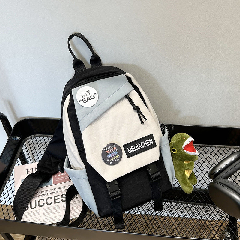 Stylish unisex patchwork everyday backpack, color block design, ideal for school, travel & daily use.