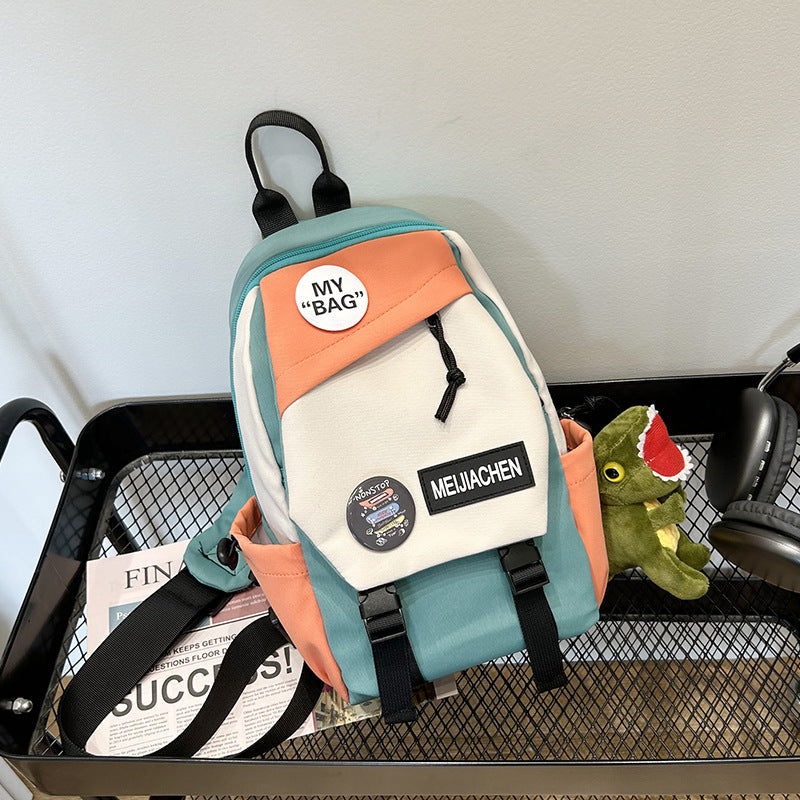 Trendy casual patchwork backpack for men & women, spacious, multiple compartments, perfect for school/travel.