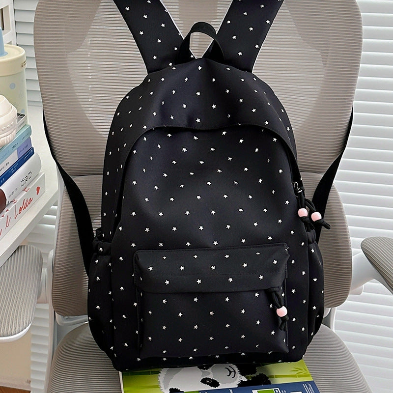 Stylish unisex star-embellished everyday backpack, perfect for school, travel, or daily use.