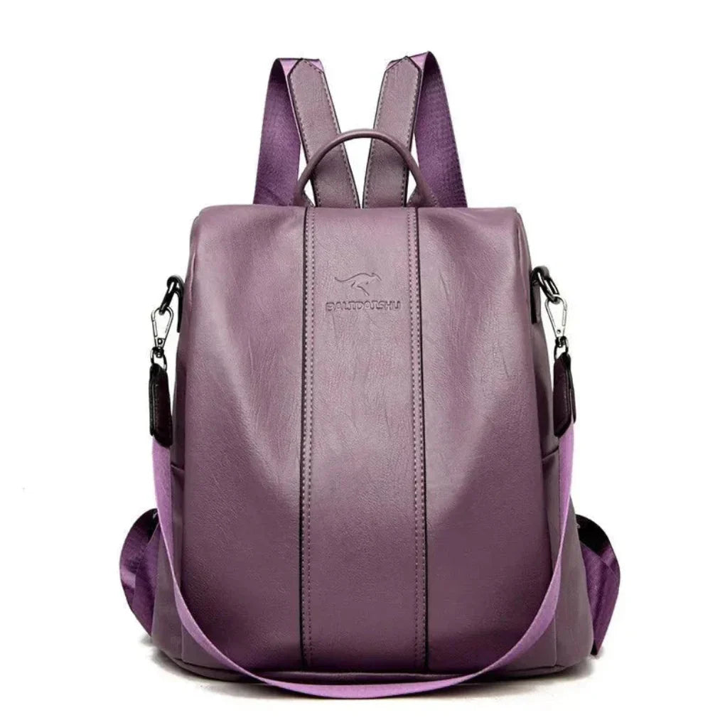 Chic anti-theft women's leather backpack with hidden zippers & RFID protection, ideal for secure daily travel.