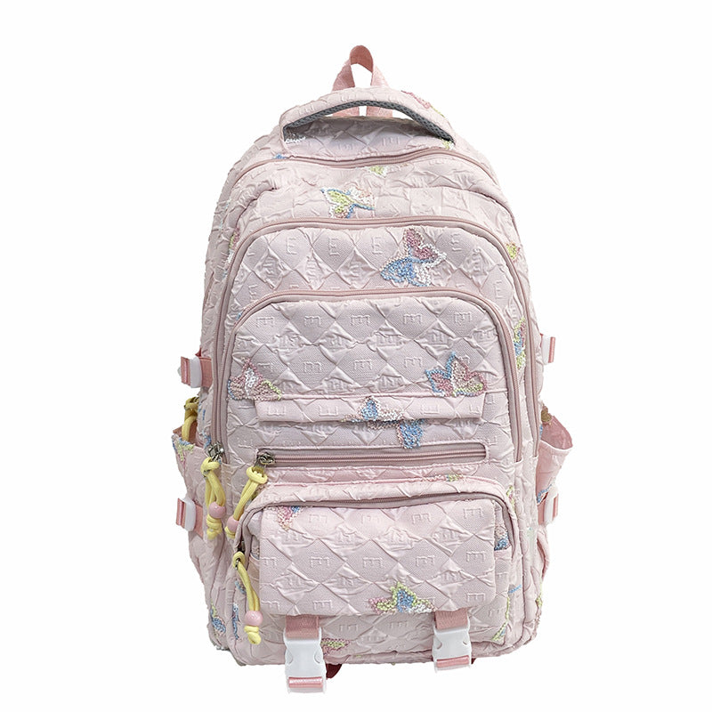 Fashionable & durable women's backpack featuring elegant butterfly details, perfect for travel or daily essentials.