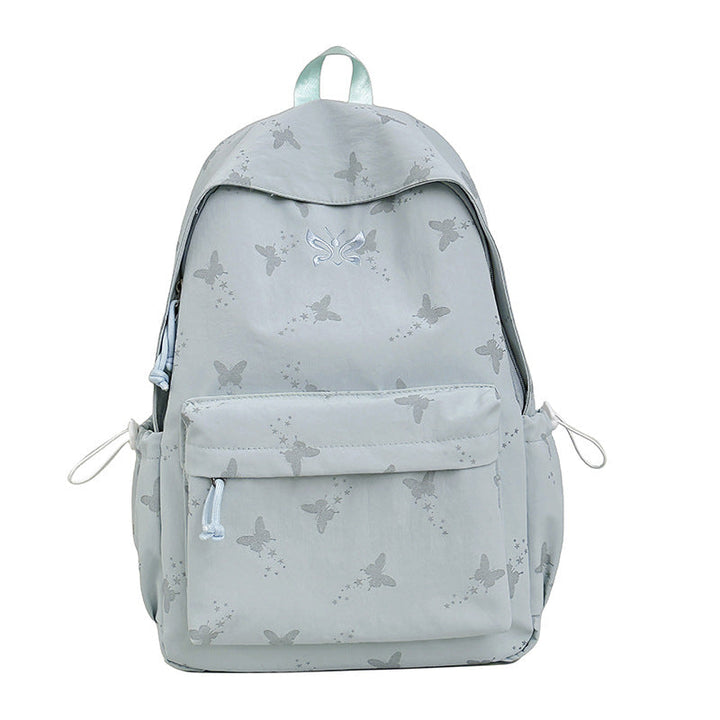 Lightweight butterfly print women's backpack, versatile for school, everyday carry, and stylish casual use.