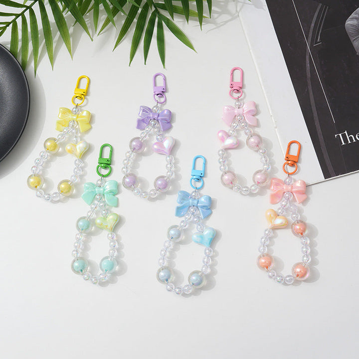 Stylish women's beaded charm keychain with vibrant colors, perfect as a decorative bag accessory or fashion gift for her.