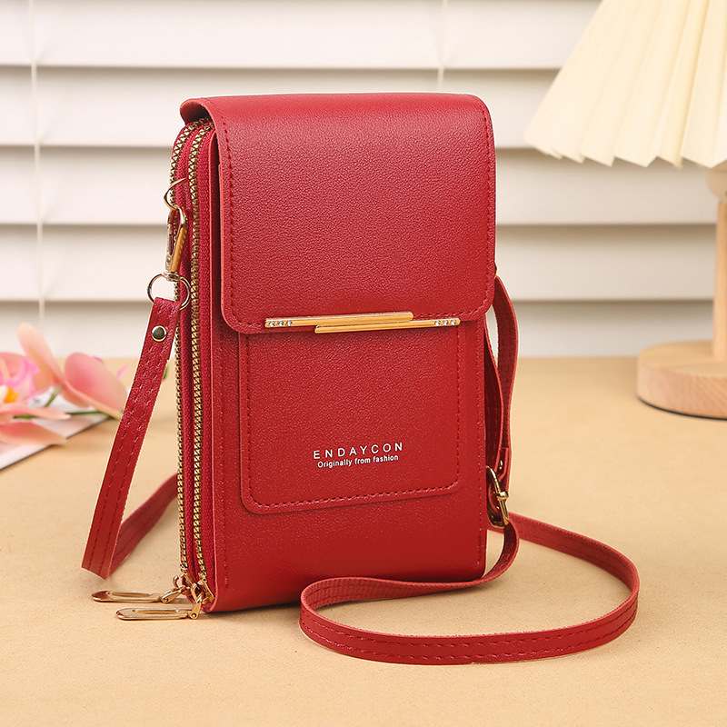 Stylish women's black touchscreen phone bag & wallet crossbody. Compact & hands-free for daily use.