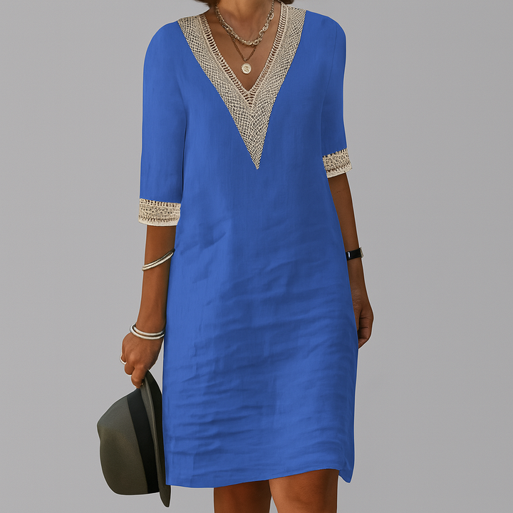 Relaxed fit women's sleeveless midi dress, ideal for breezy summer days & elegant vacation style.