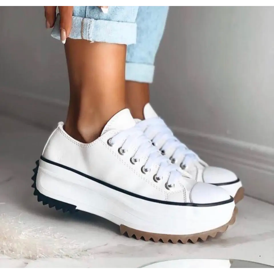 Fashionable women's chunky platform sneakers, low top design & comfortable for versatile everyday wear.