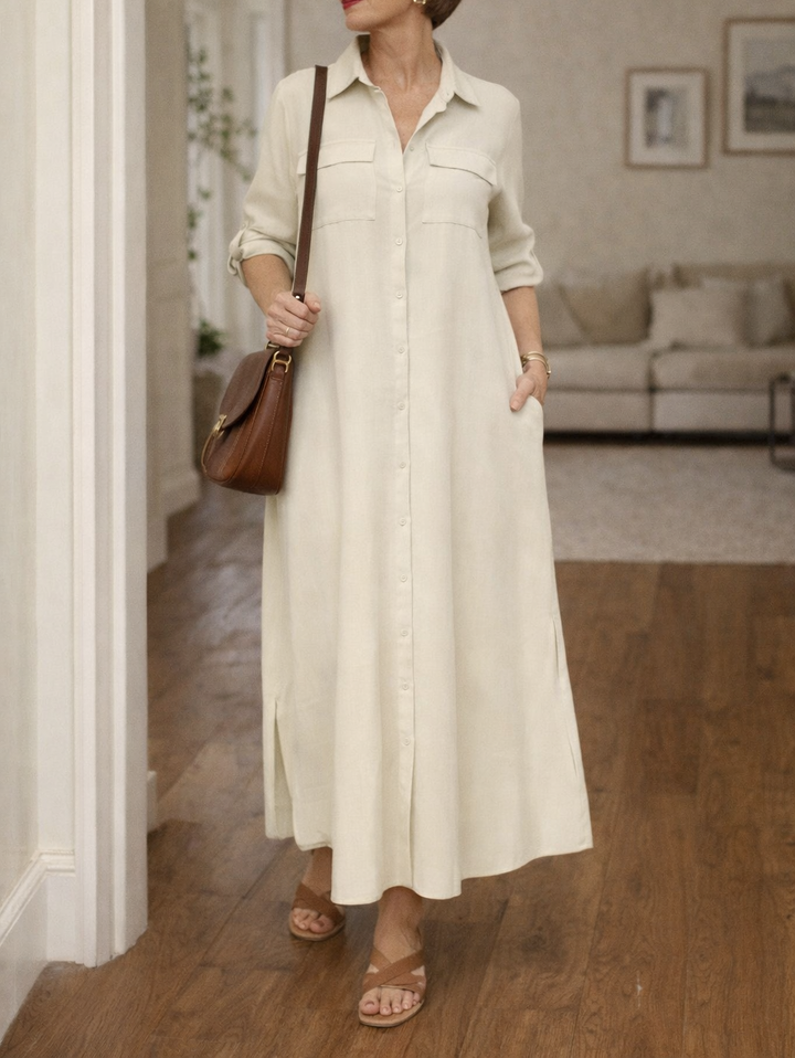 Long sleeve women's maxi dress with full button front, collared, offering a comfortable, relaxed fit for weekend.
