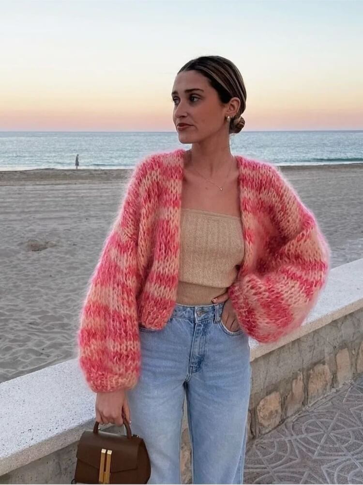 Modern women's color-block cropped sweater. A comfortable, stylish long-sleeve knit top, ideal for trendy casual wear.