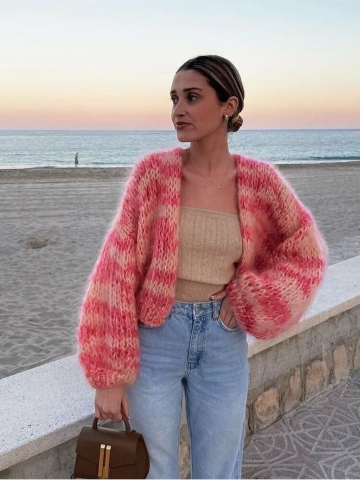 Modern women's color-block cropped sweater. A comfortable, stylish long-sleeve knit top, ideal for trendy casual wear.