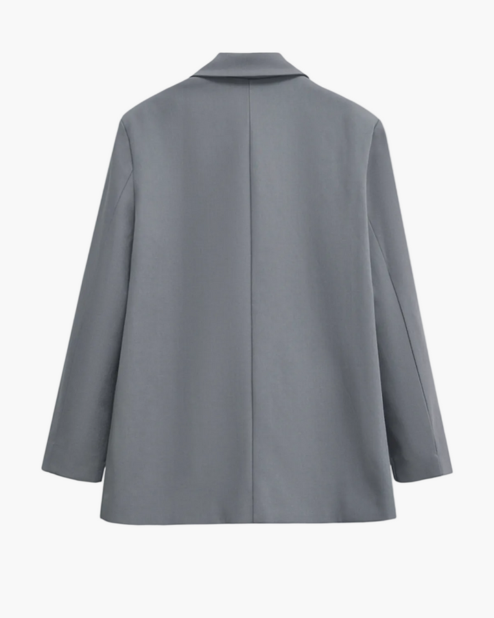 Elegant black double-breasted women's blazer, perfect for formal workwear & professional fashion. Two-button style.