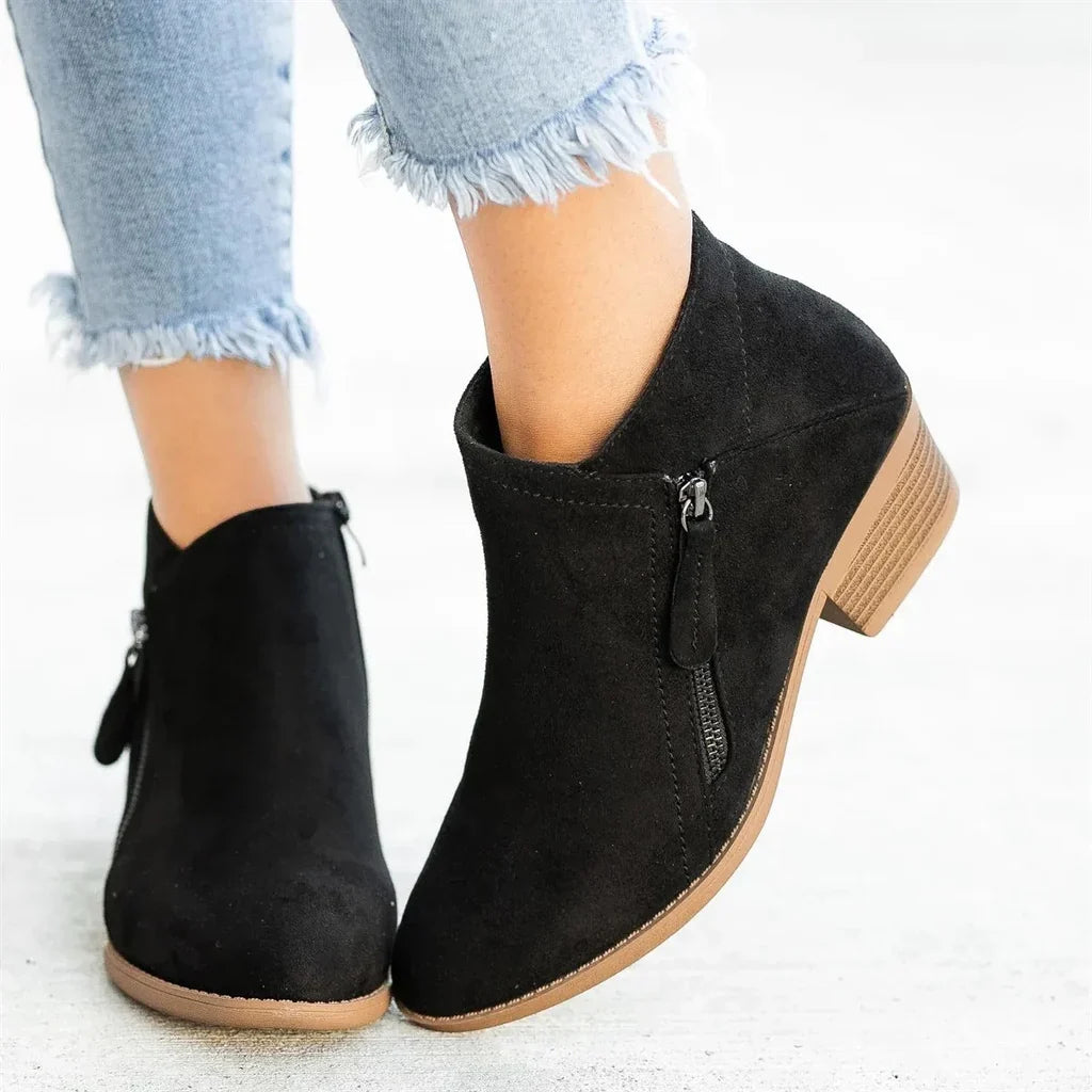 Comfortable women's walking boots with supportive footwear design, offering style for everyday fall fashion.