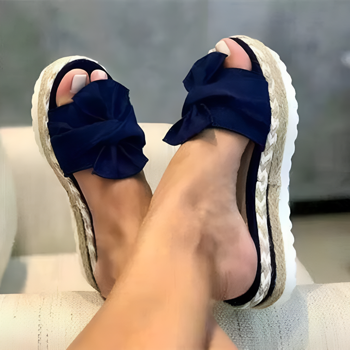 Ergonomic women's walking sandals with adjustable straps and built-in arch support for daily wear.