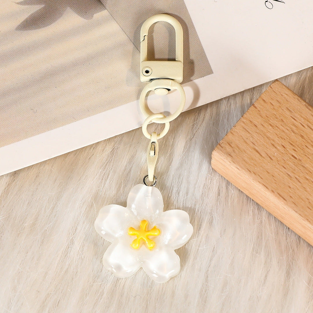 Artistic floral key chain, a decorative flower bag charm and functional key holder for women.