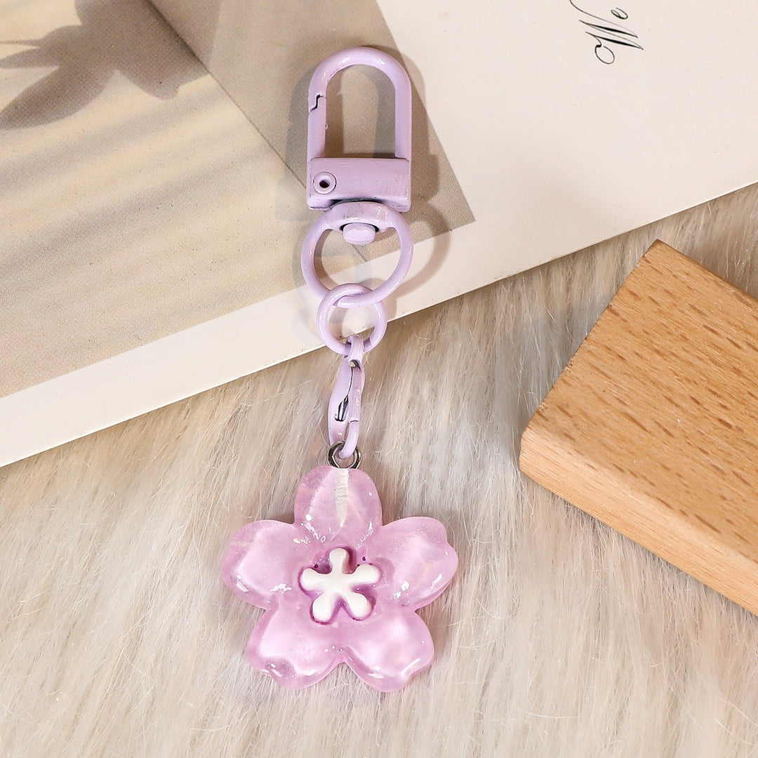 Fashionable women's floral bag accessory, a beautiful flower keychain and stylish key holder.