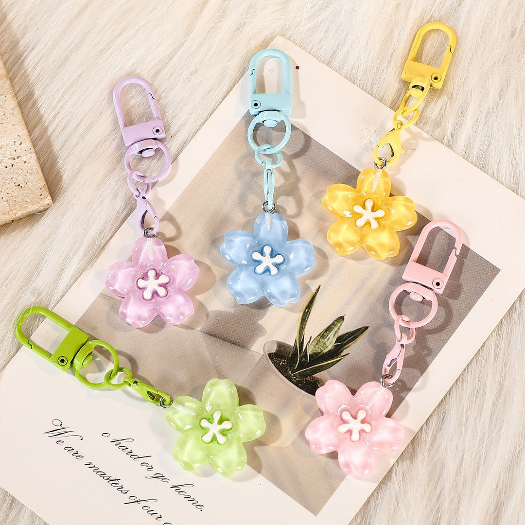 Vibrant floral keychain for women, a stylish flower bag charm and functional key accessory.