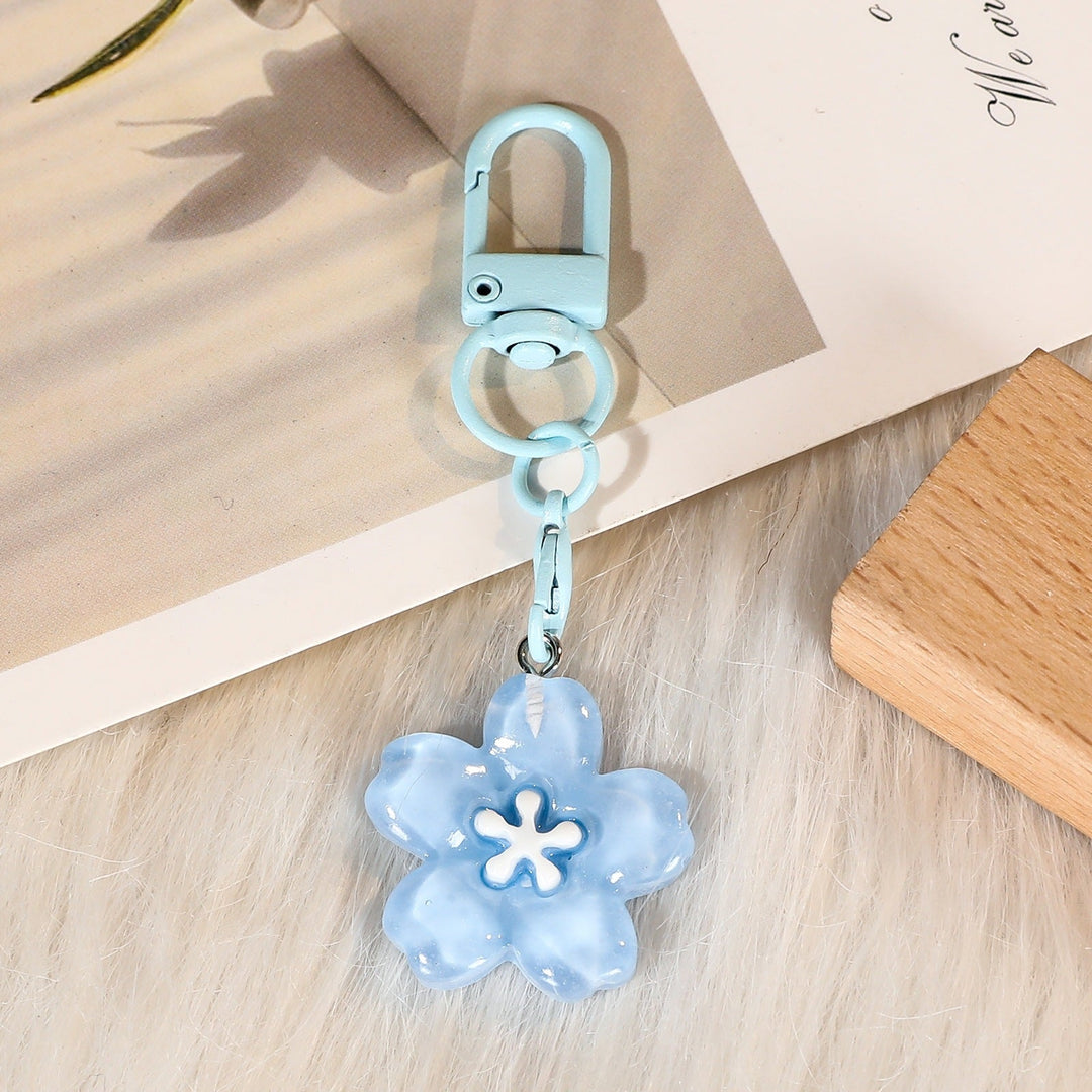 Modern floral keychain with a unique flower charm, a chic accessory for women's keys or bags.