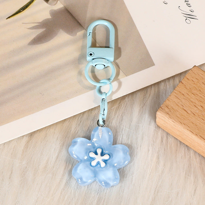 Modern floral keychain with a unique flower charm, a chic accessory for women's keys or bags.