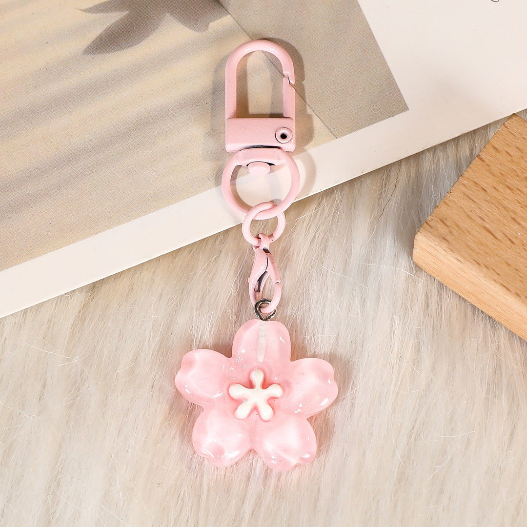 Chic women's floral keychain, a stylish flower design perfect as a bag charm or key organizer.