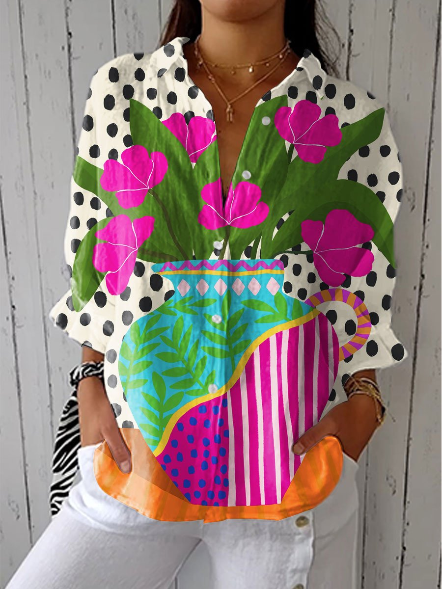 Stylish Women's Floral Print Button-Front Long Sleeve Shirt. Casual & versatile blouse for everyday fashion.