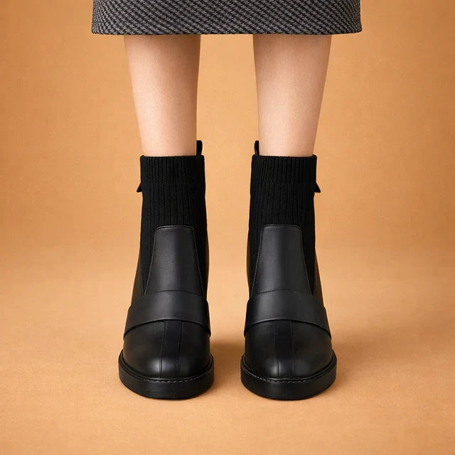 Fashionable women's heeled ankle boots, designed as sock boots for a sleek, modern, & comfortable look.
