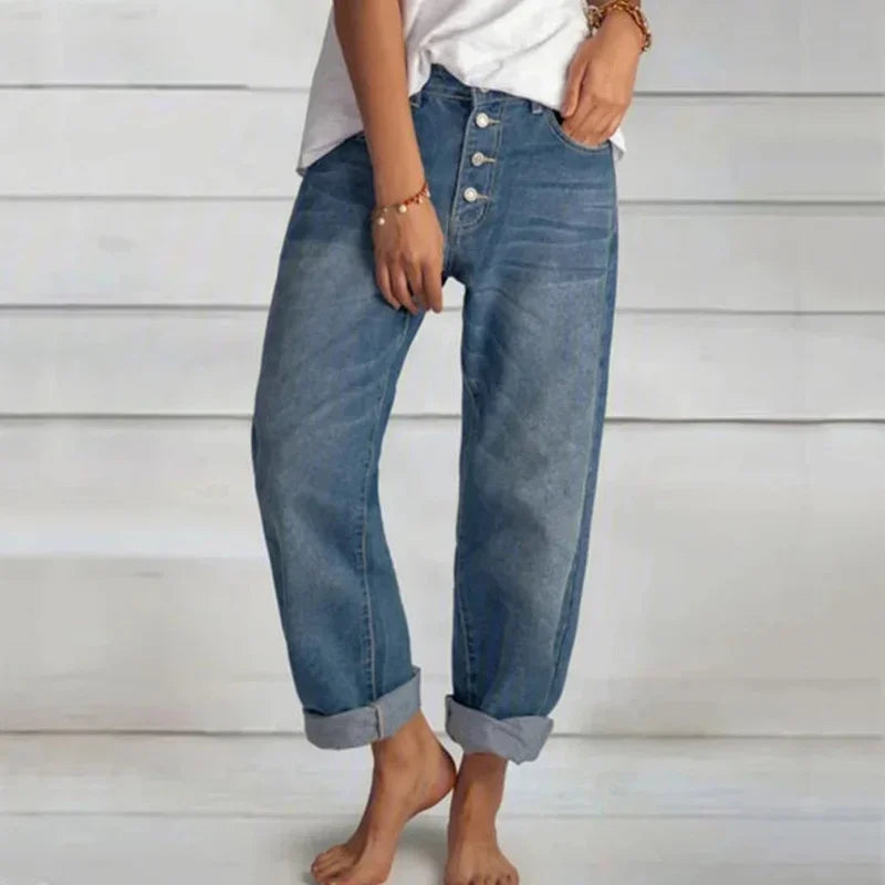 Comfortable women's loose-fit high-waist blue jeans. Versatile denim pants for everyday fashion.