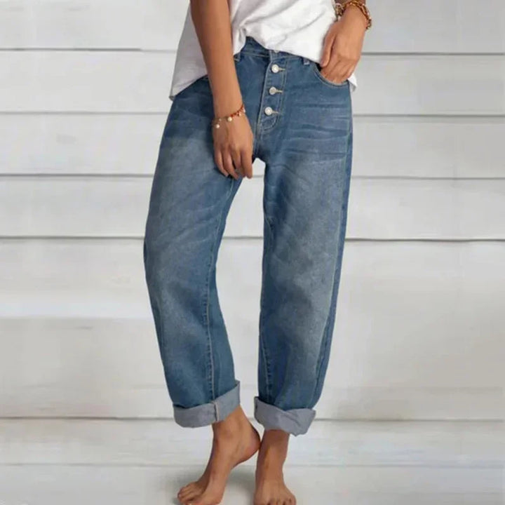 Comfortable women's loose-fit high-waist blue jeans. Versatile denim pants for everyday fashion.
