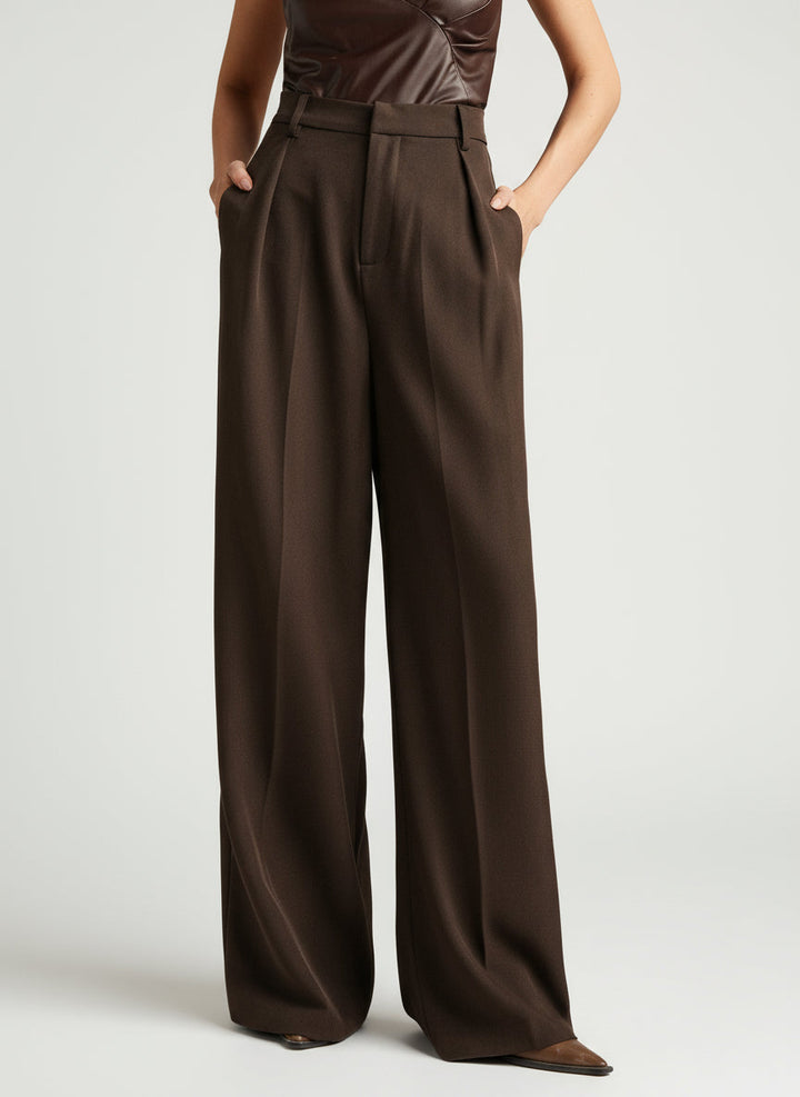 Fashionable women's wide leg trousers, tailored with a flattering high waist for a refined professional style.