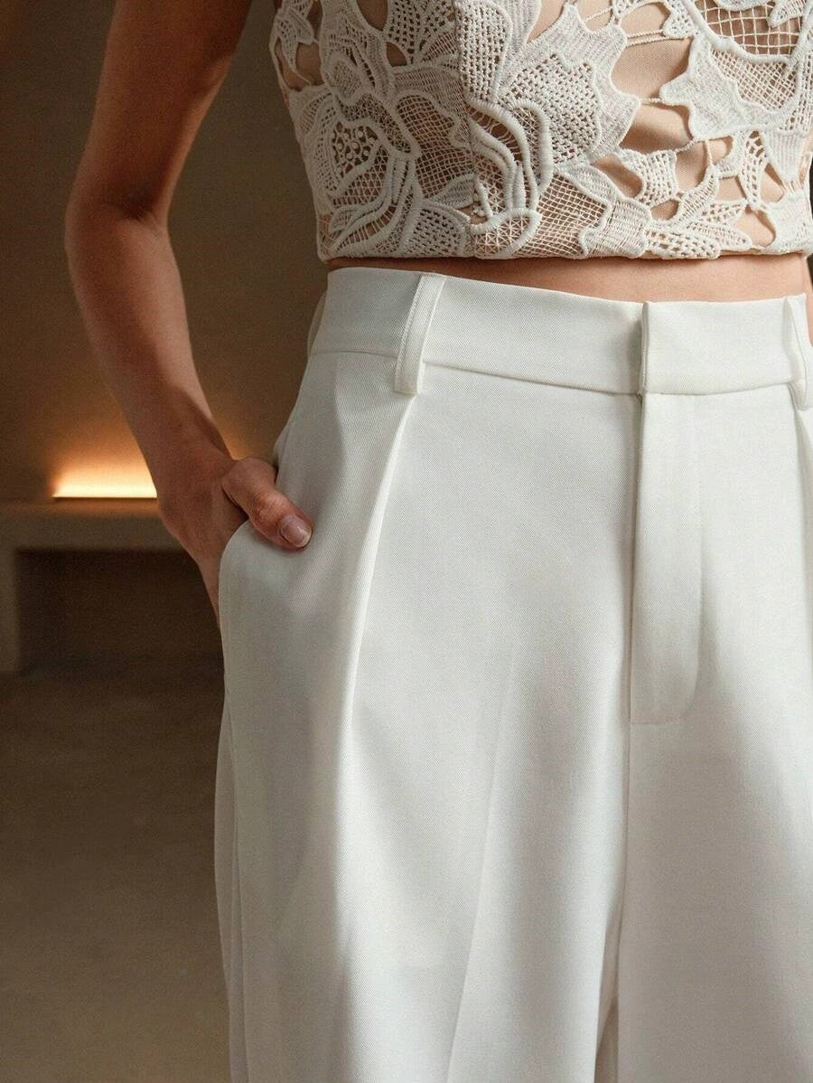 Women's high waist wide leg tailored trousers. Elevate your work wardrobe with these elegant professional pants.