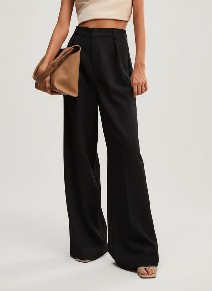 Graceful women's wide leg tailored trousers with a high waist. Essential for elegant office and smart casual.