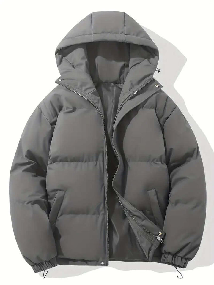 Everyday women's hooded puffer jacket. Warm, stylish winter outerwear, ideal for daily cold weather comfort.