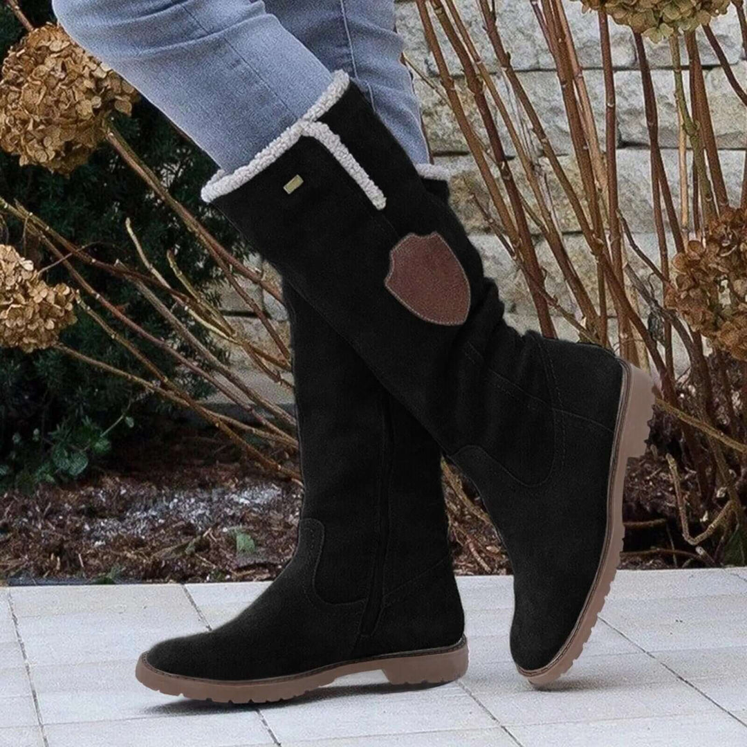 Women's warm winter boots with insulated lining. Non-slip sole for snow. Cozy, comfortable, and stylish footwear.