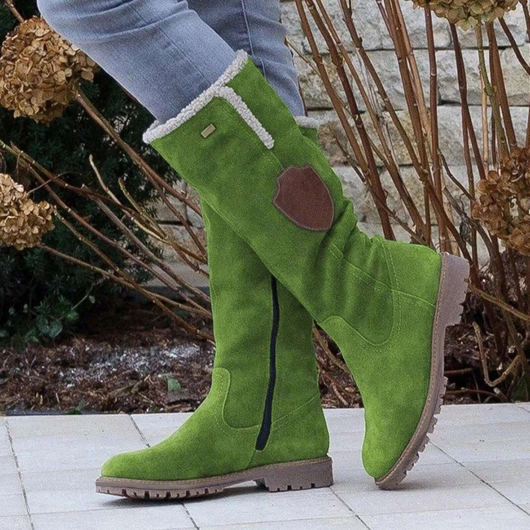 Insulated women's snow boots for winter. Stylish, warm, and comfortable. Non-slip footwear for cold, icy conditions.
