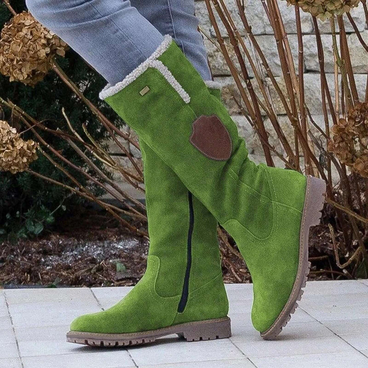 Insulated women's snow boots for winter. Stylish, warm, and comfortable. Non-slip footwear for cold, icy conditions.