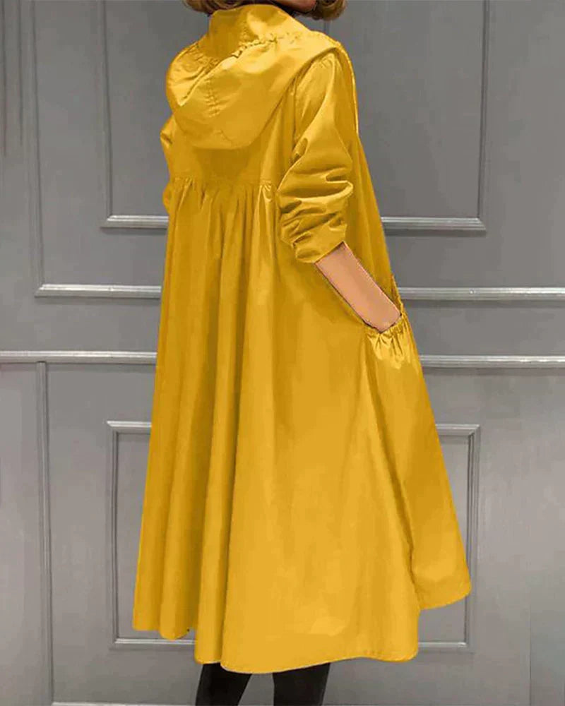 Modern knee-length women's waterproof jacket, hooded & stylish, perfect for casual spring & autumn outfits.