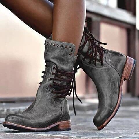 Edgy women's studded lace-up boots with a comfortable low heel. Versatile casual & fall footwear.
