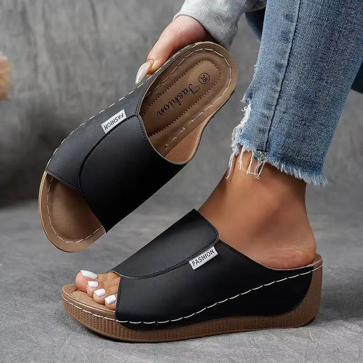 Elegant open-toe women's sandals. Lightweight, arch-supporting footwear for stylish summer casual wear.